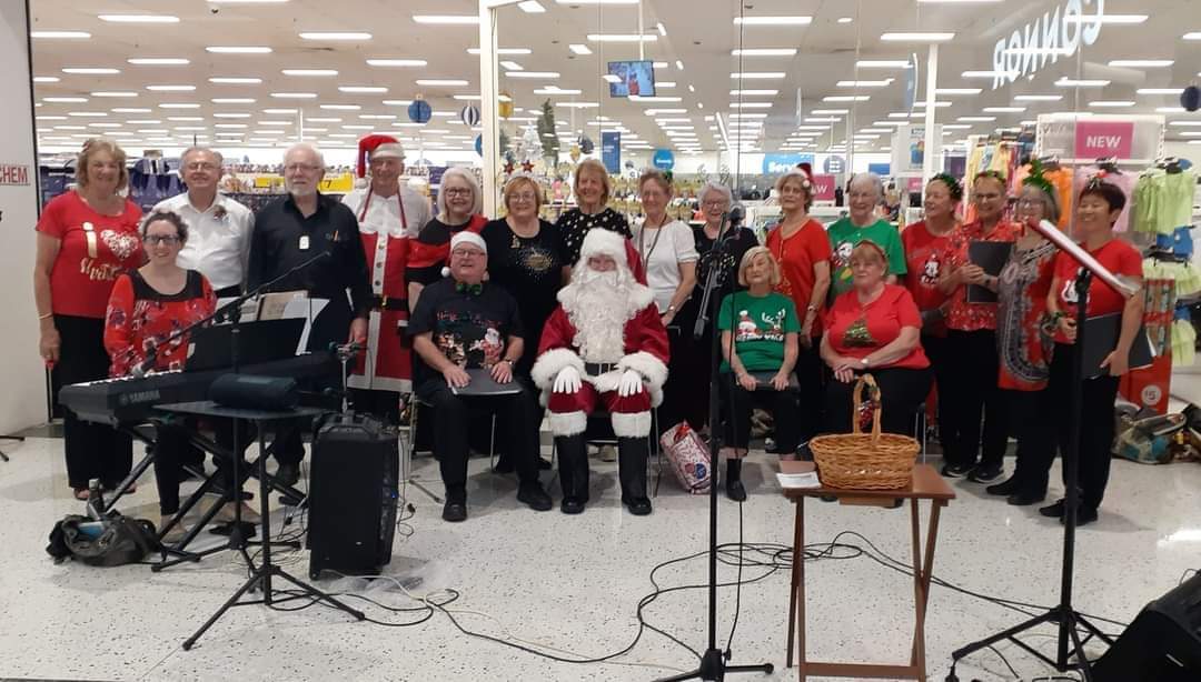 The District Singers perform at Menai Central