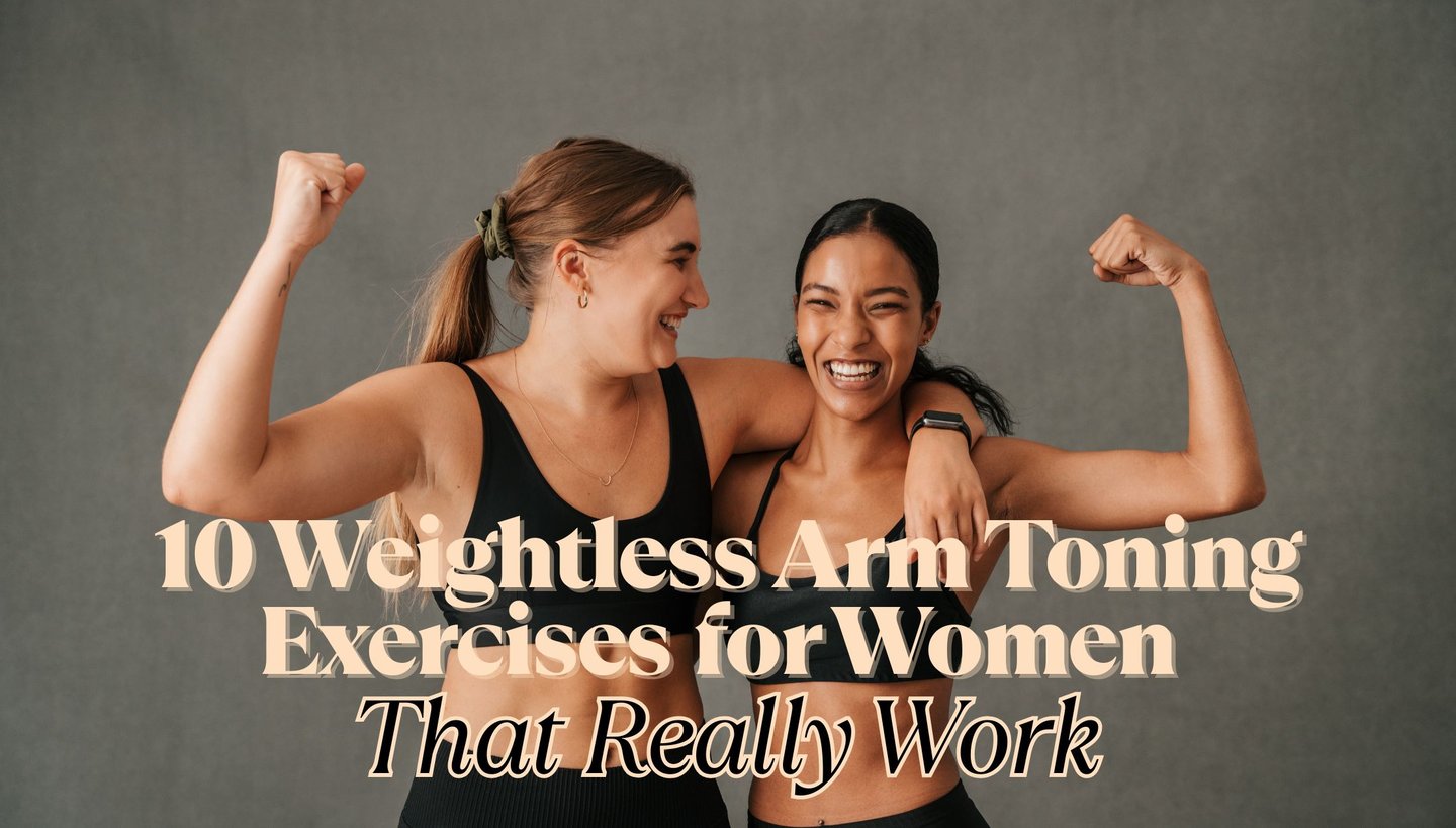 two women standing next to each other with their arms up and arms up