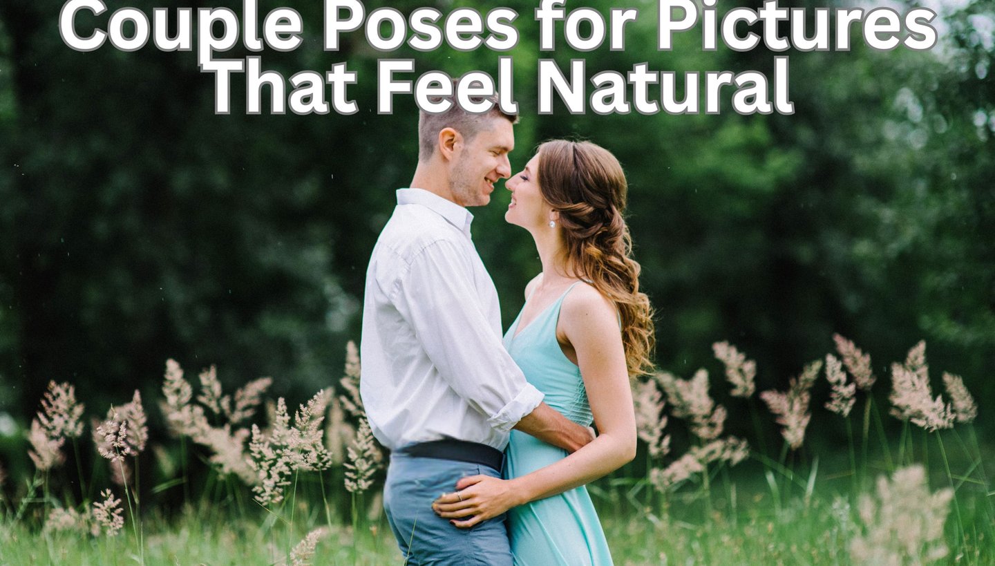 A smiling couple embracing in a field, demonstrating natural engagement photo poses.