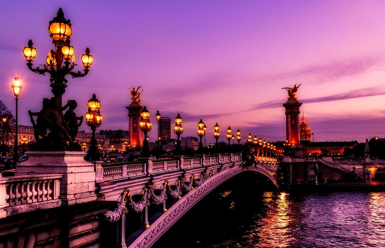 Seine River at sunset with Paris bridges and architecture