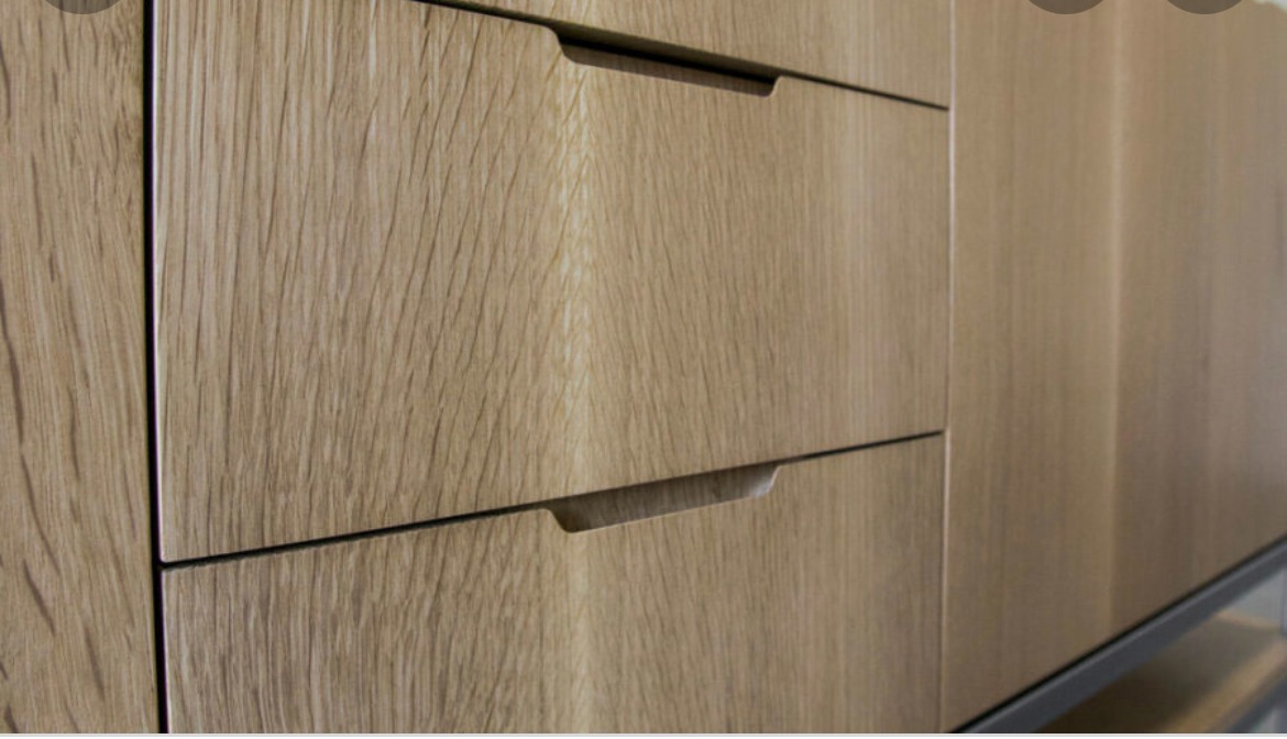 Close up detailed view of custom created closet drawers.