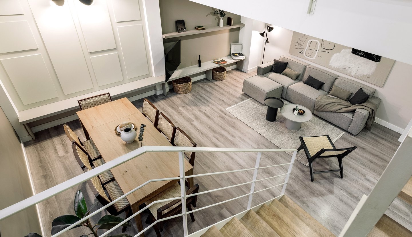 Contemporary loft apartment with a minimalist design, subtle lighting, neutral colors in Barcelona
