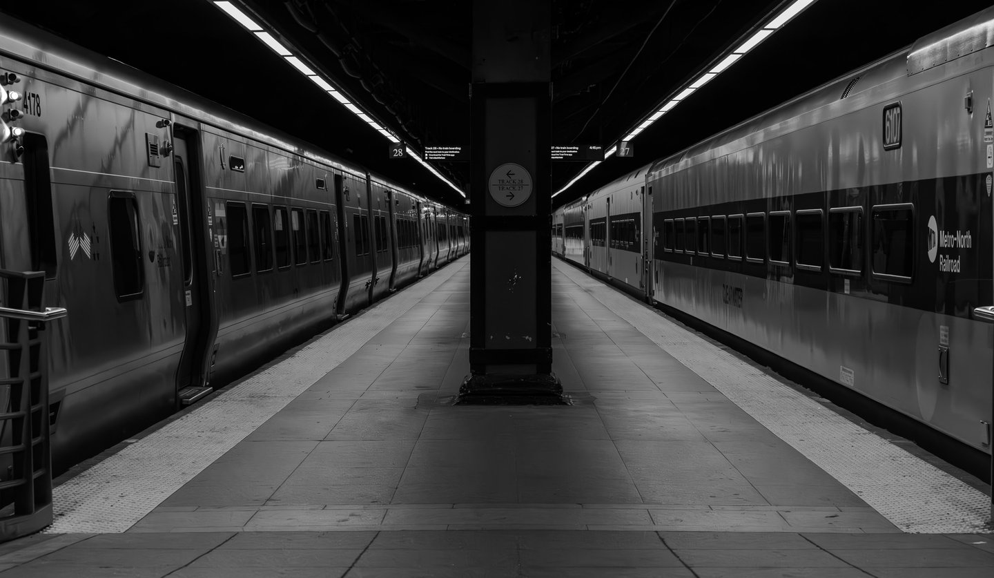 metro north train station with a clock on the platform