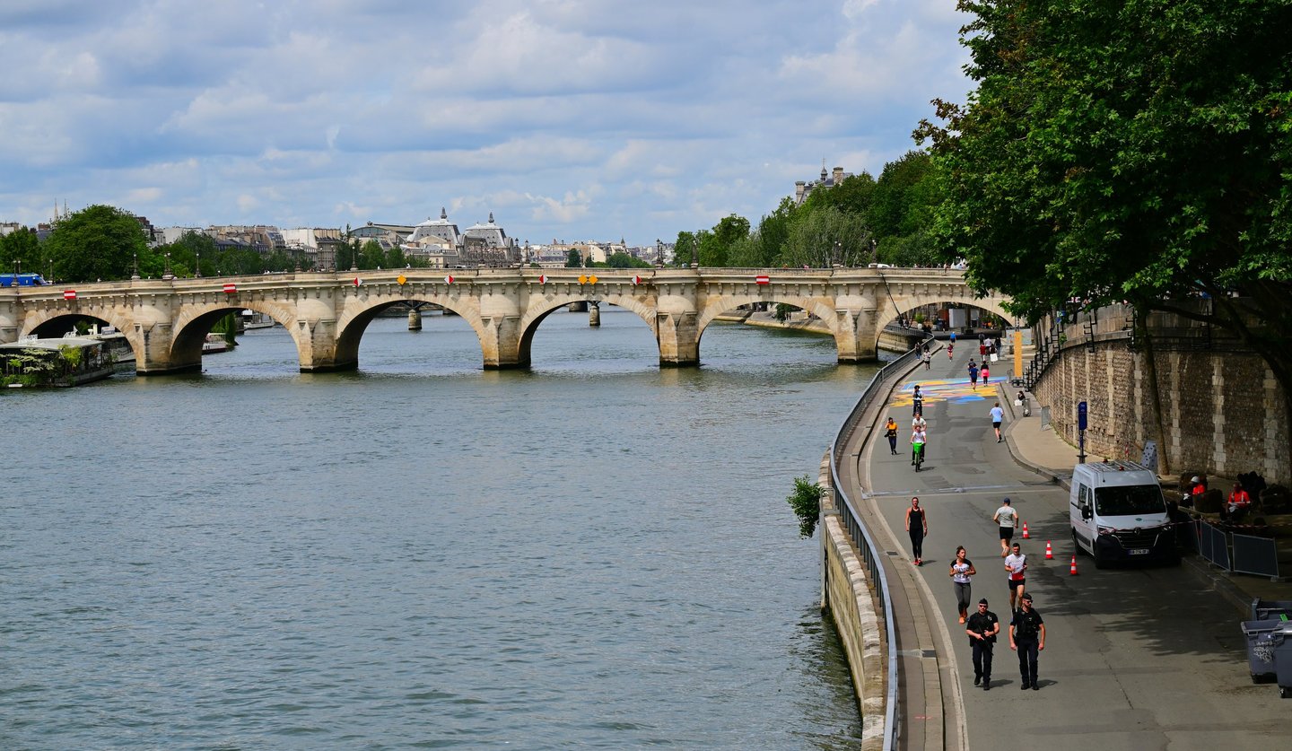 Seine River banks with historic bridges and Parisian architecture