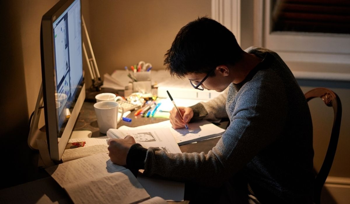 college student at desk studying