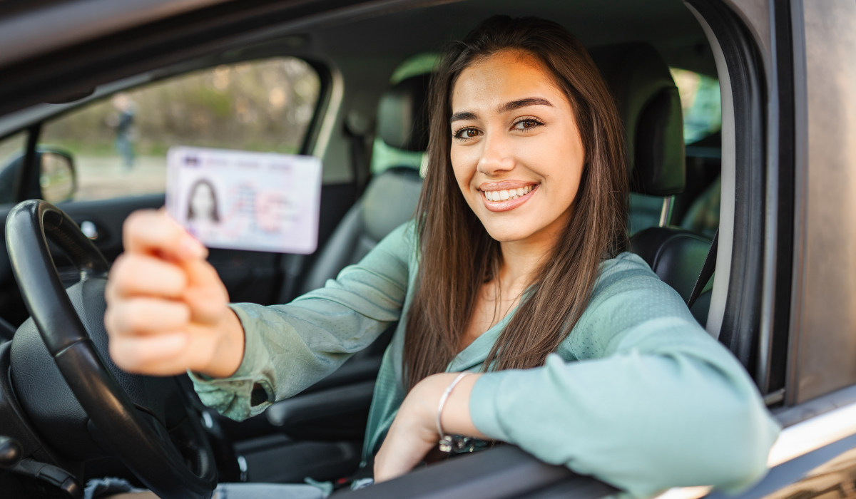 new florida resident showing her driver's license