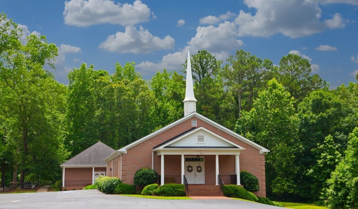 red brick church with steeple