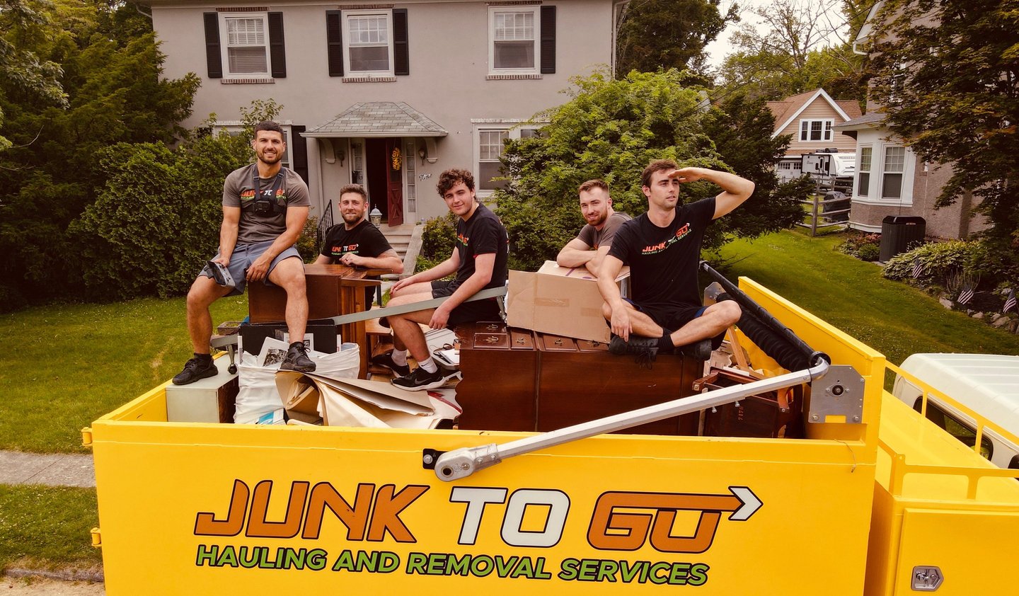 Junk To Go hauling crew and truck in Montgomery County.