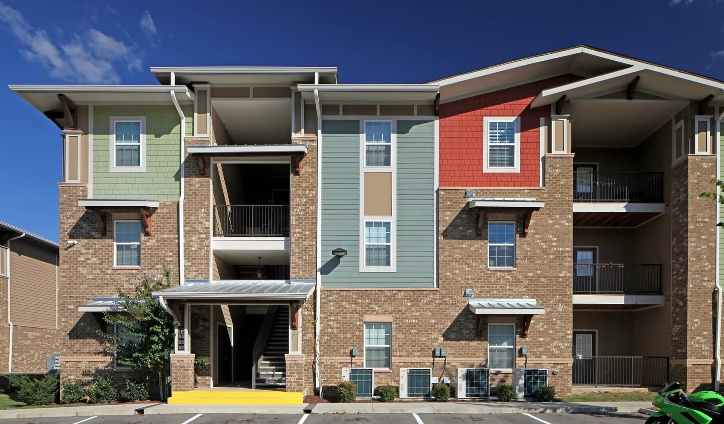 a motorcycle parked in front of a building