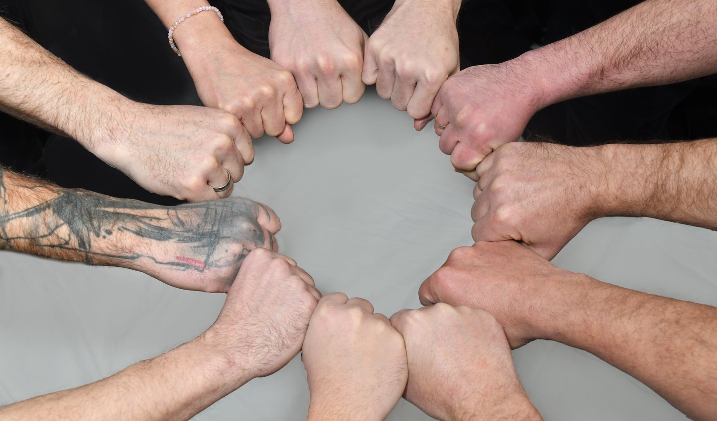Teamfoto Handkreis