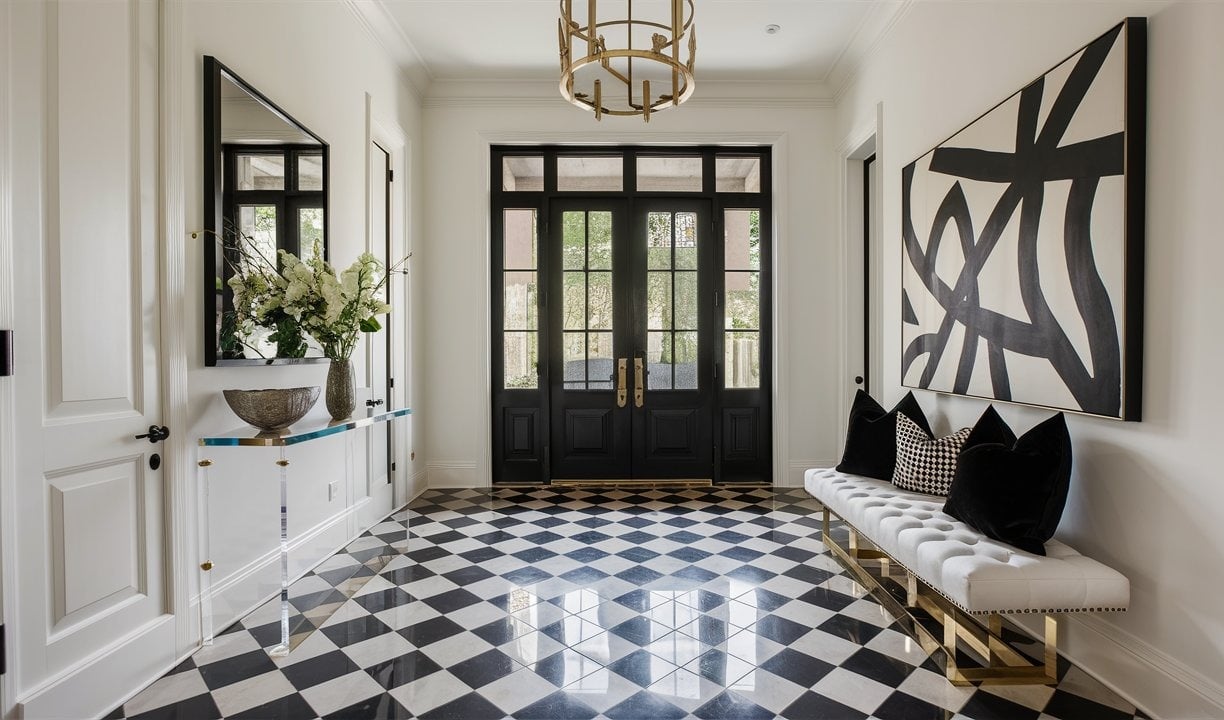 a black and white checkered floor plan with a bench and a bench
