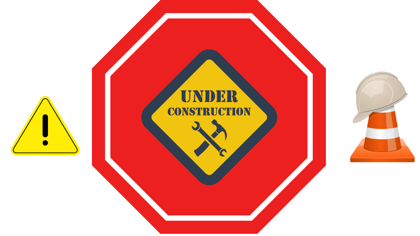 a construction worker's work area with a construction sign