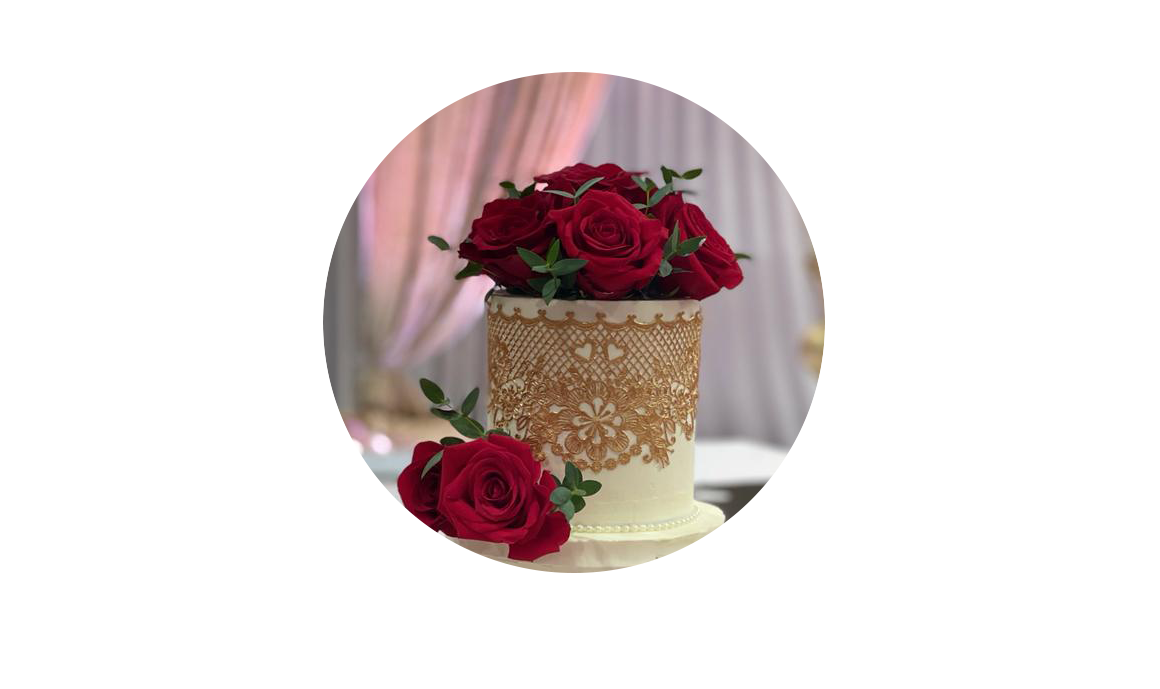 a cake with red roses on top of it