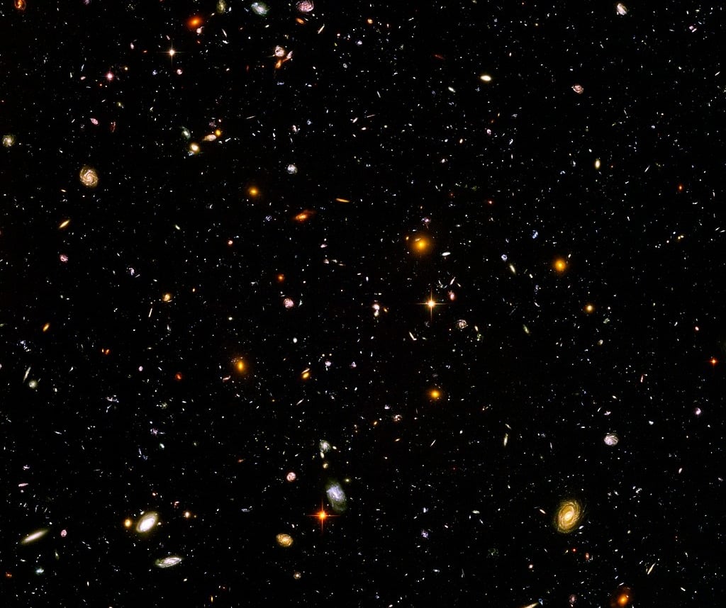 The Hubble deep field view, about one 24-millionth of the whole sky. Each spec of light a Galaxy!
