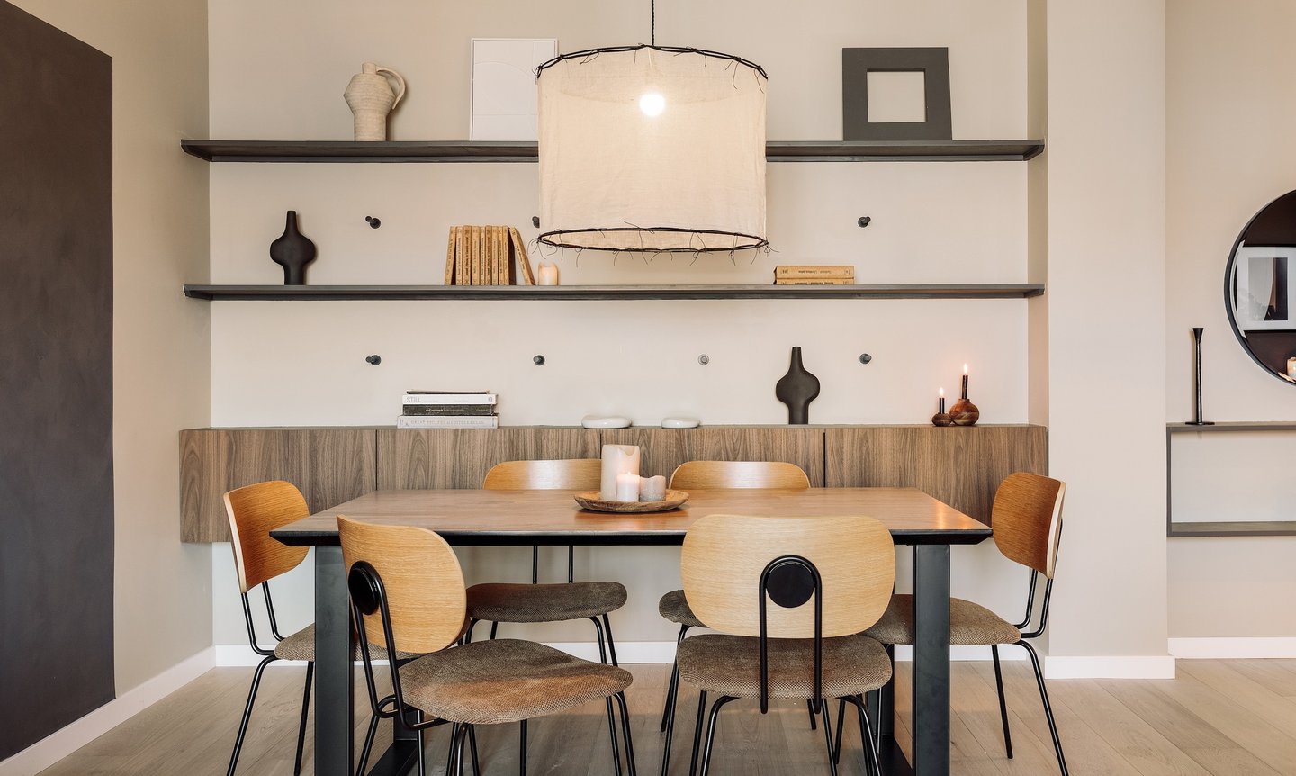 Contemporary dining area with bold color accents and clean lines design by SAVIA