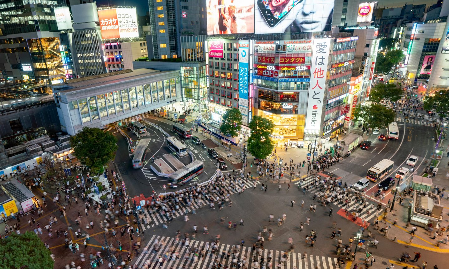 Aerial view of Shibuya Crossing Tokyo with massive crowds crossing intersection