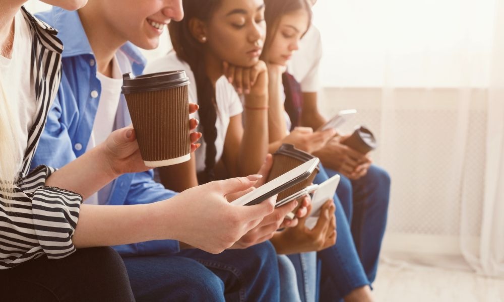 teens glued to their phones on soc med