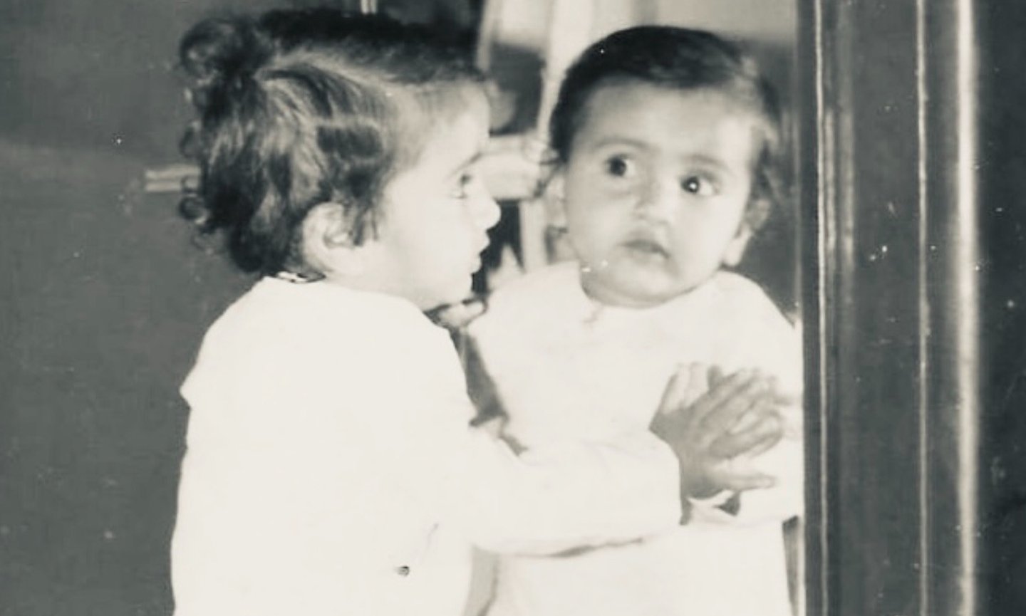A child looking into the mirror is used as an invitation to connect for collaboration.