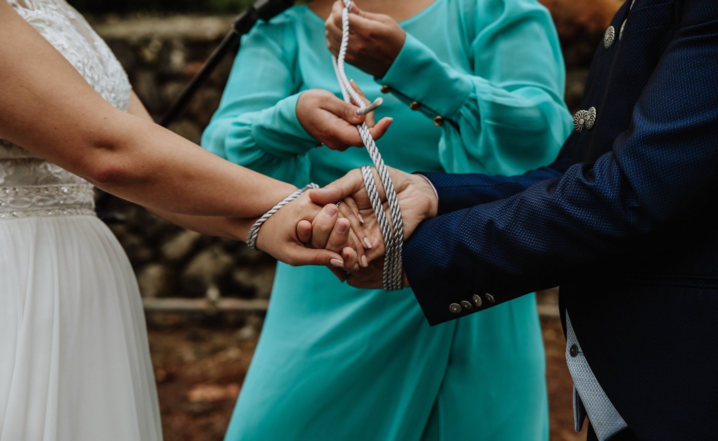 a couple - tie the knot on their special day