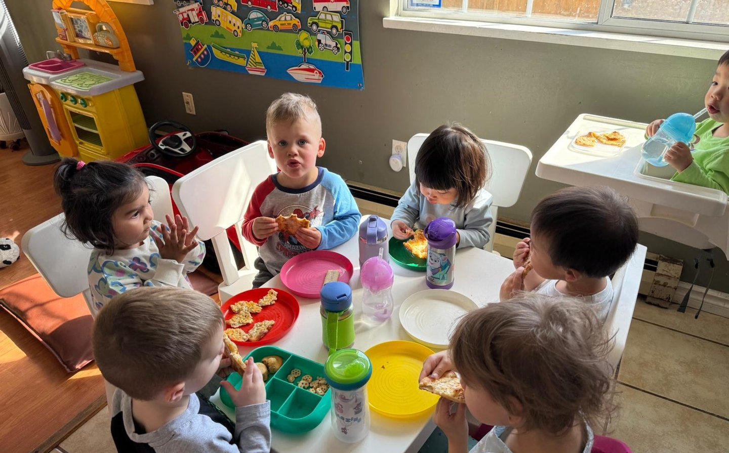 Mixed Aged Toddlers Having Their Food Together