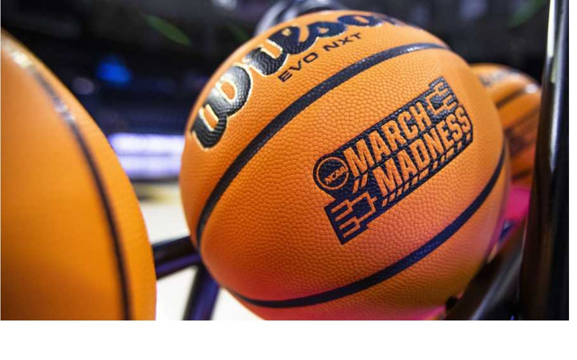 NCAA March Madness basketball on a rack during a college basketball tournament game.