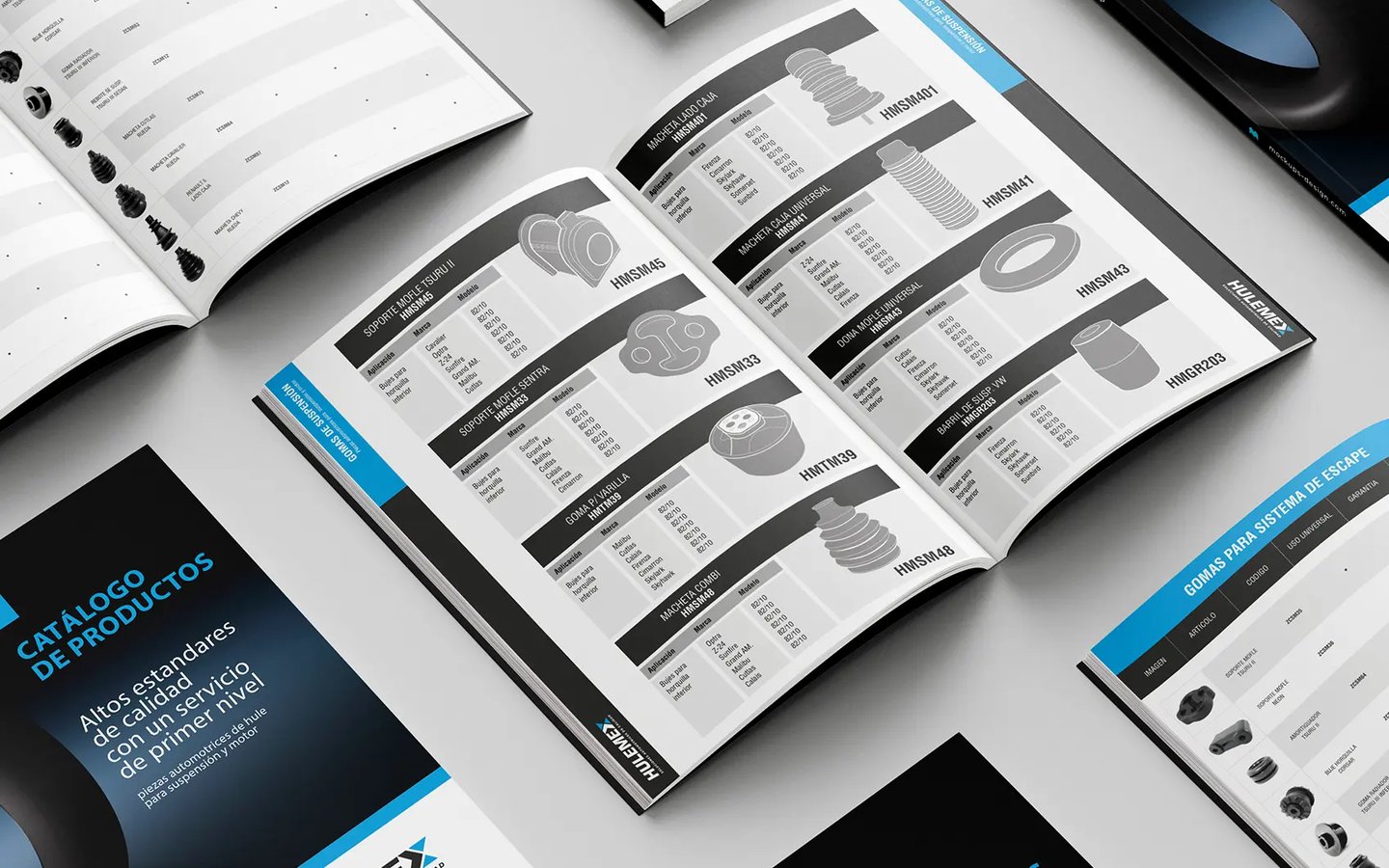Cataloghi prodotti Hulemex aperti su tavolo, materiali stampati coordinati nel percorso di branding 