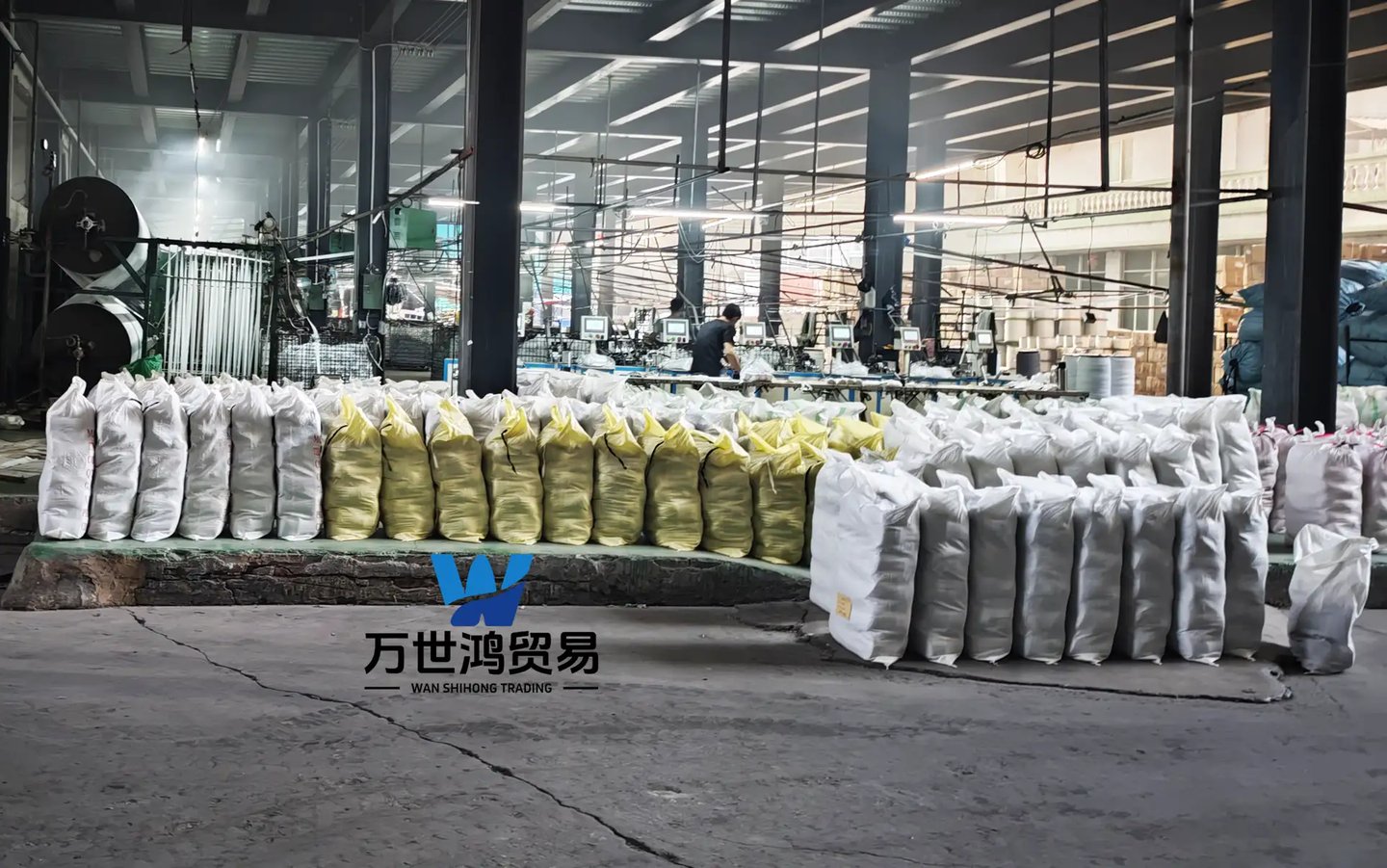 Spacious industrial manufacturing plants and warehouses are filled with white and yellow goods await