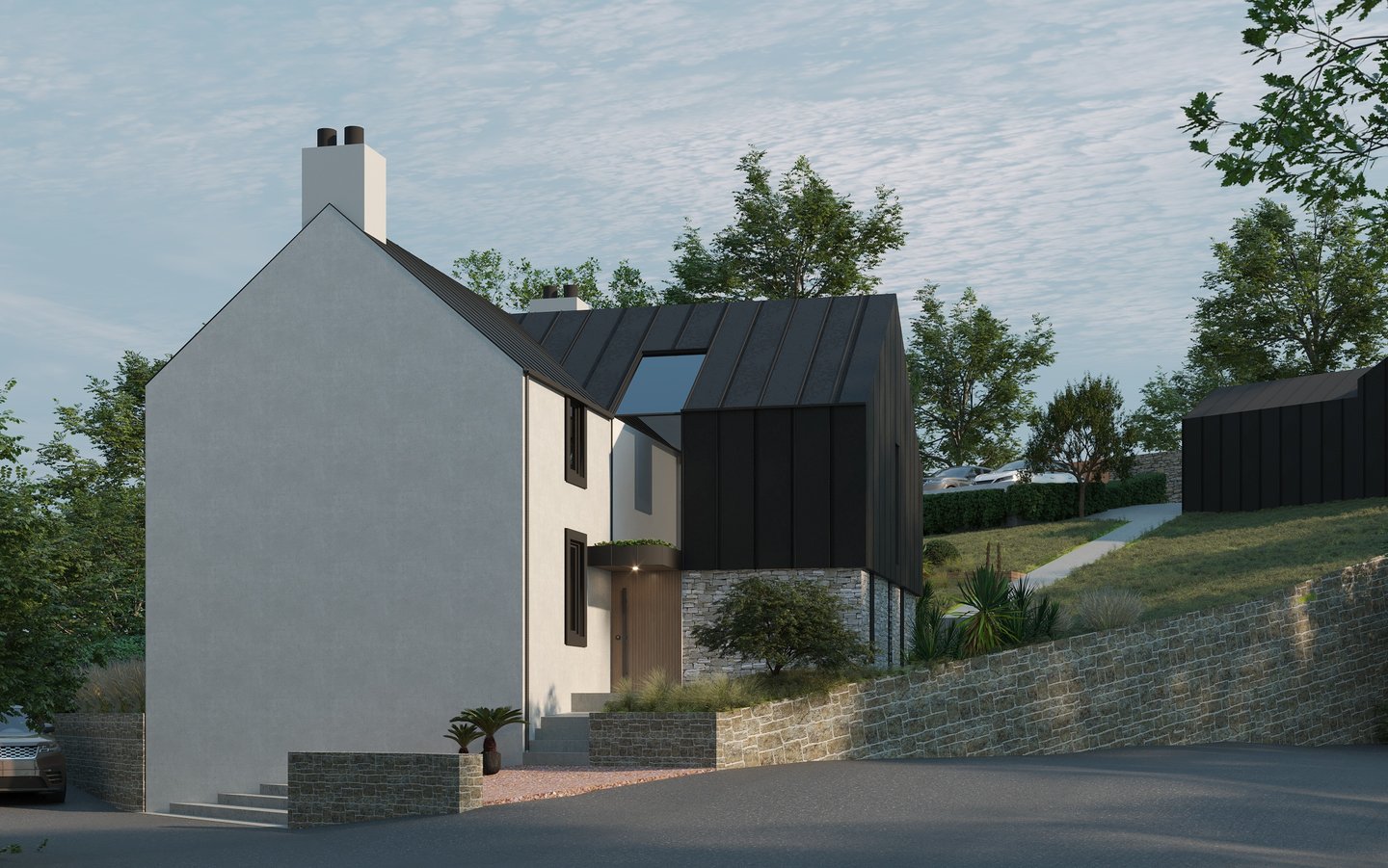 Modern luxury home architecture with black standing seam metal and white render exterior finishes.