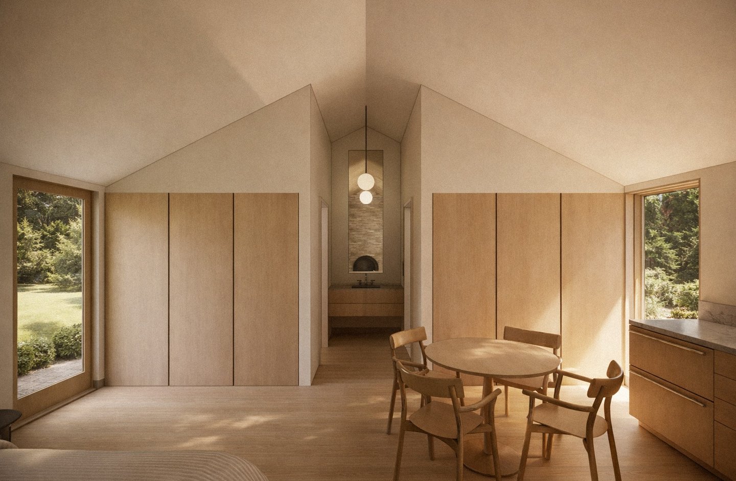 Minimalist modern dining area with a wood table, chairs, vaulted ceiling, and natural sunlight.