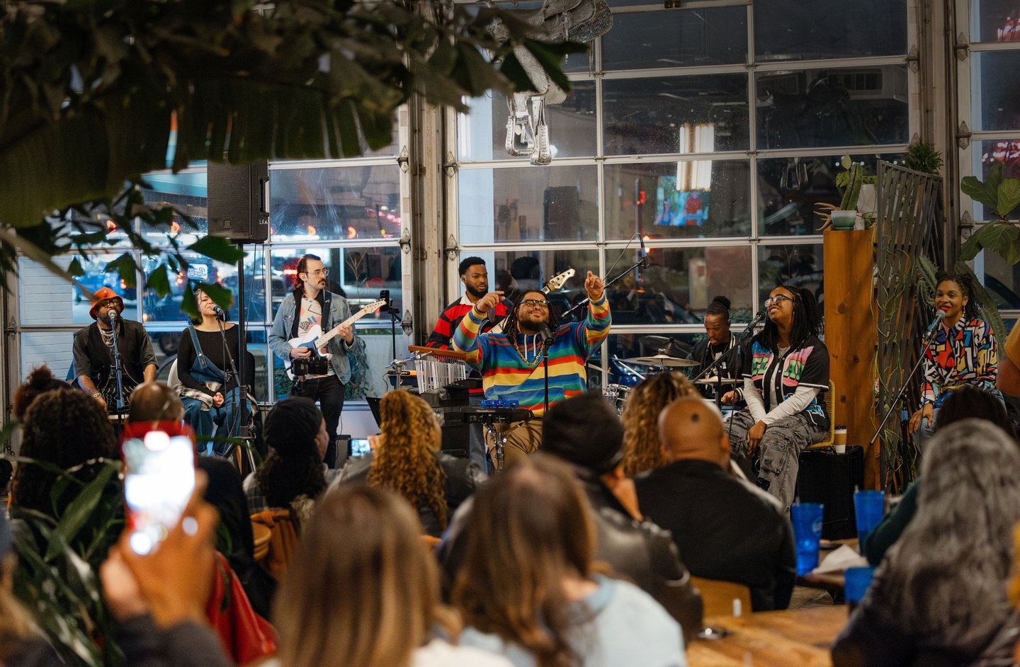 a band playing music in a cafe