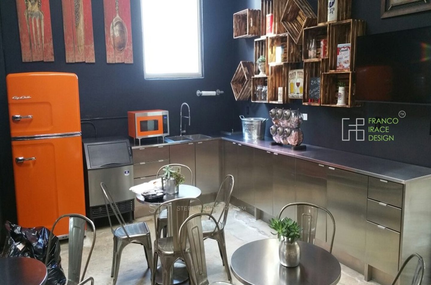 Modern commercial kitchen with stainless steel cabinetry