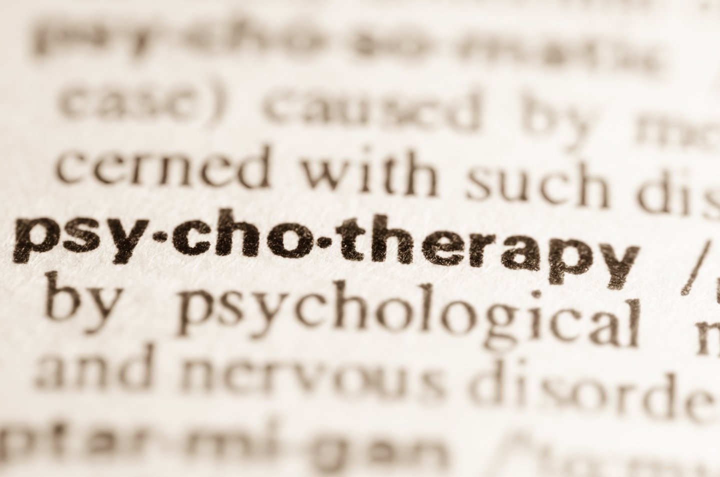 Eine Nahaufnahme von einem Wörterbuch von Psychotherapie