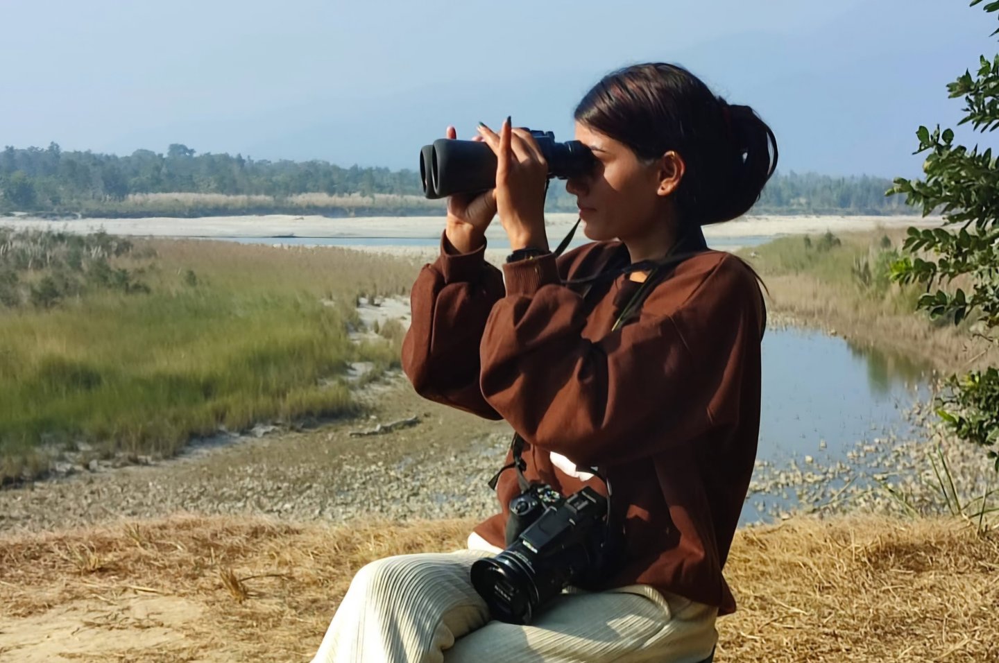 binocular observation near the river in Bardiya Park