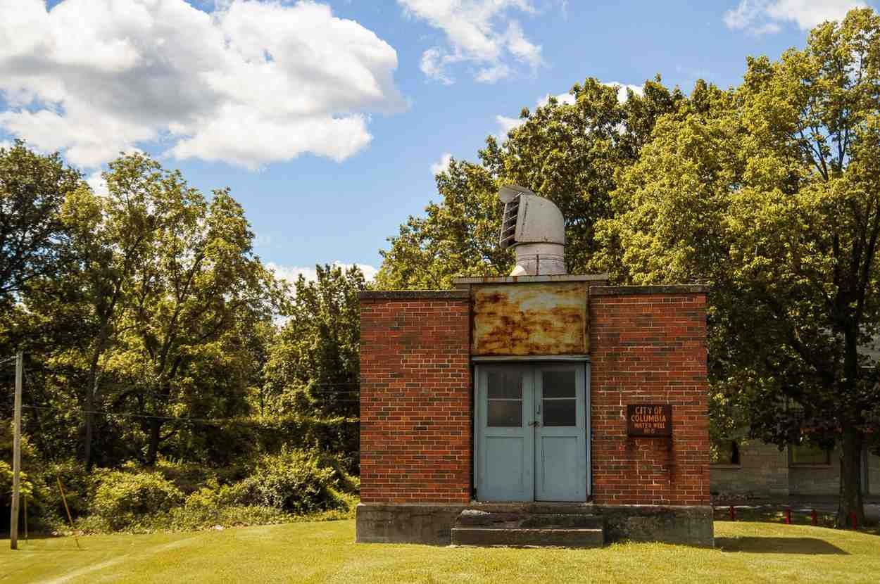 Well pump house on a Black Forest acreage property, a common moisture point checked during mold inspections