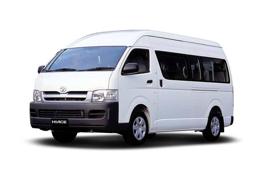 a white van with a white van parked in front of it