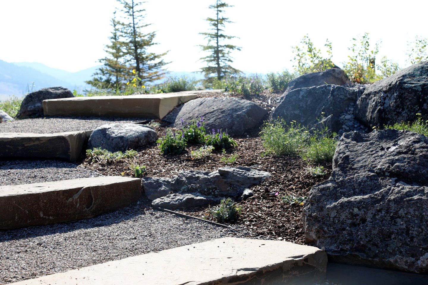 a stone steps leading up to a stone stepstone