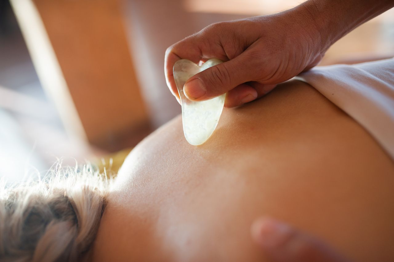 deep tension release massage as part of nervous system reset protocol, helping release chronic stres