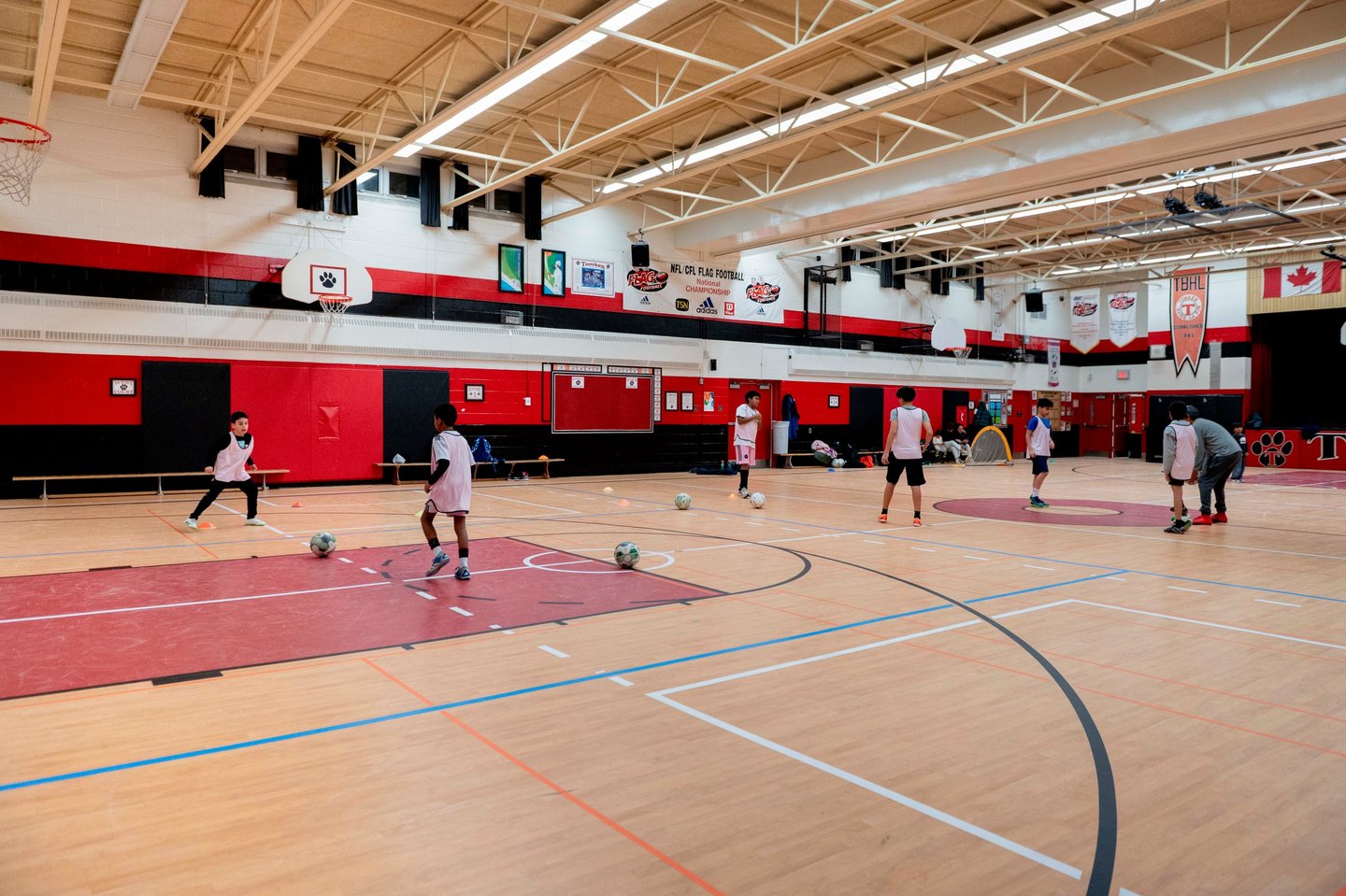 Young soccer MVB FC students practicing soccer drills indoor in MIssissauga