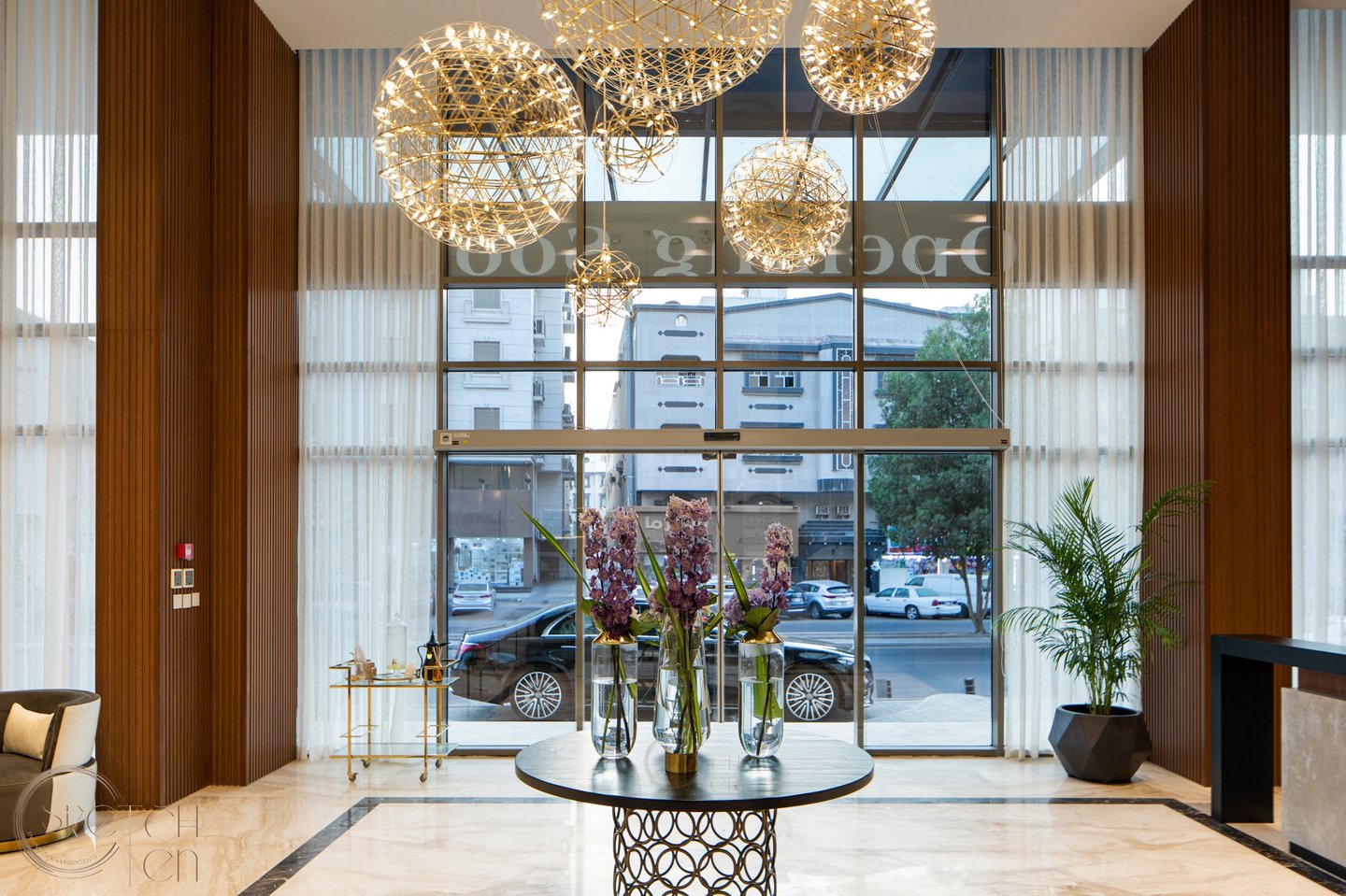 Luxurious hotel lobby with modern furnishings and elegant lighting