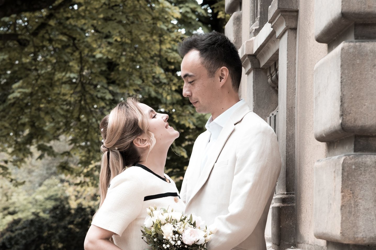 a man and woman standing next to each other