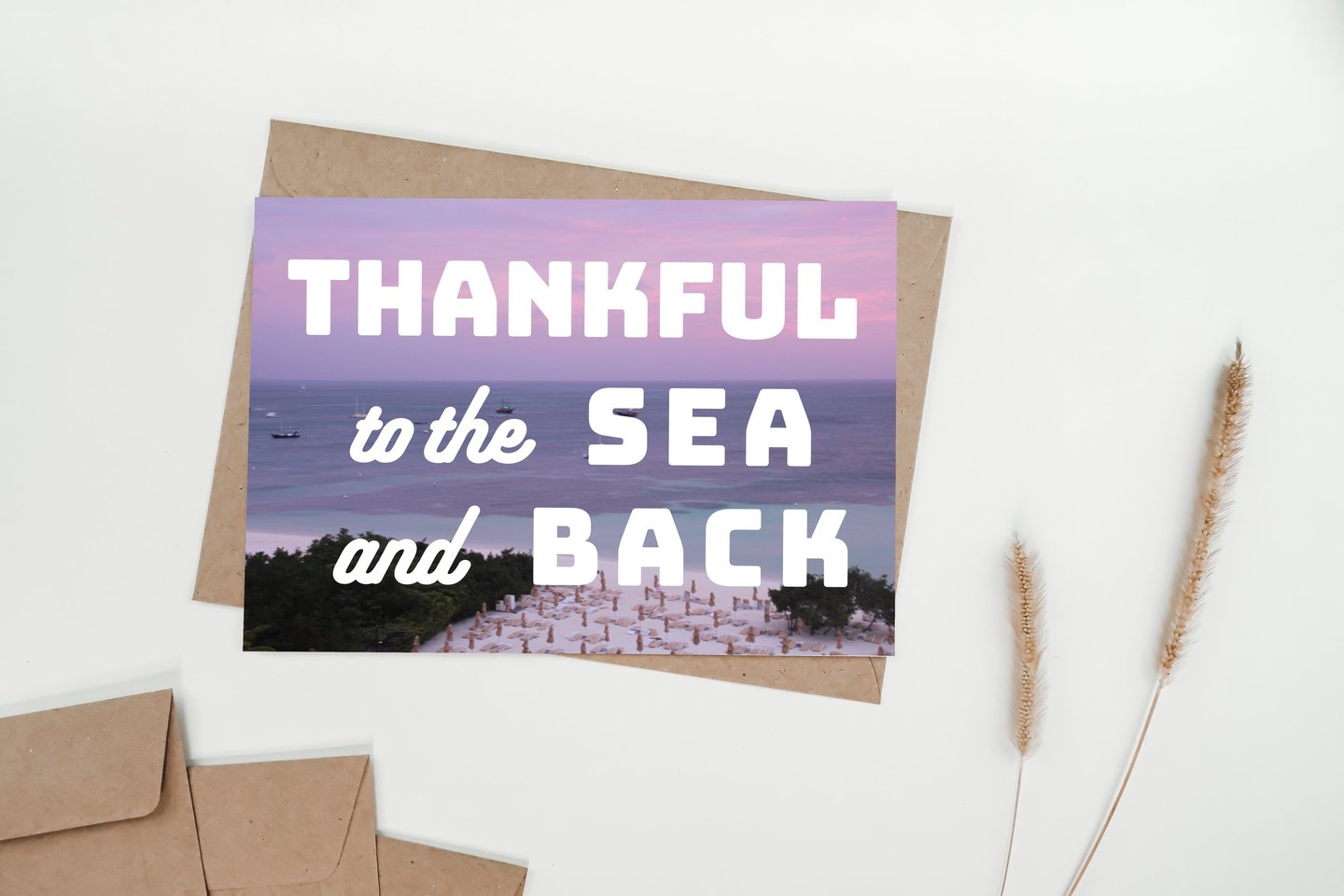 Downloadable Purple ocean card featuring the words "thankful to the sea and back"
