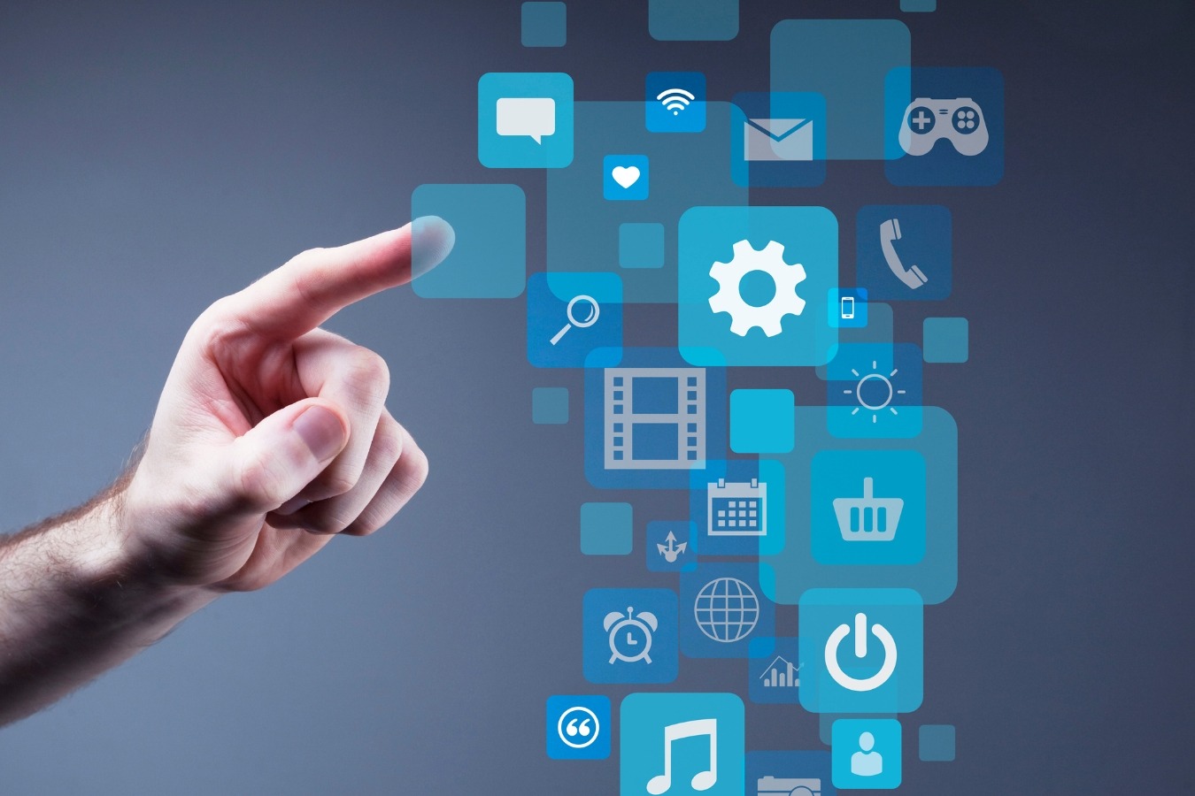 a person pointing at a screen with a finger on it-digital vs. traditional marketing