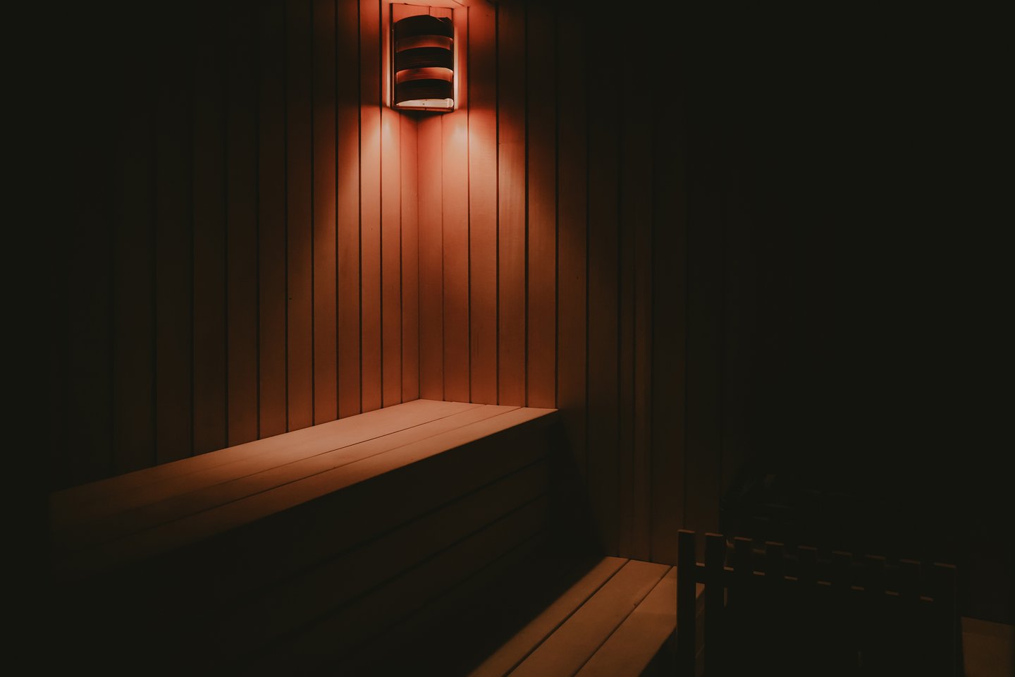 a wooden bench with a light on it