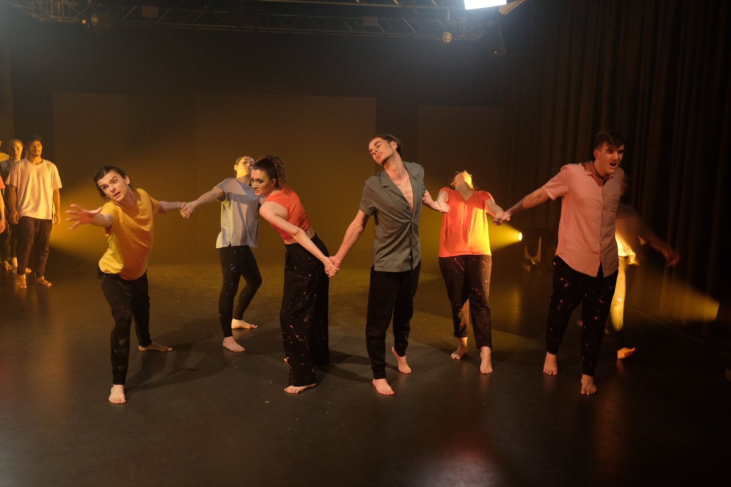 a group of people standing on a stage