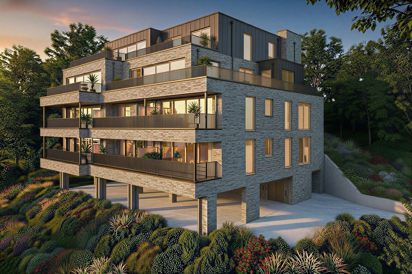 Modern grey brick apartment building with tiered balconies and luxury architecture at sunset.