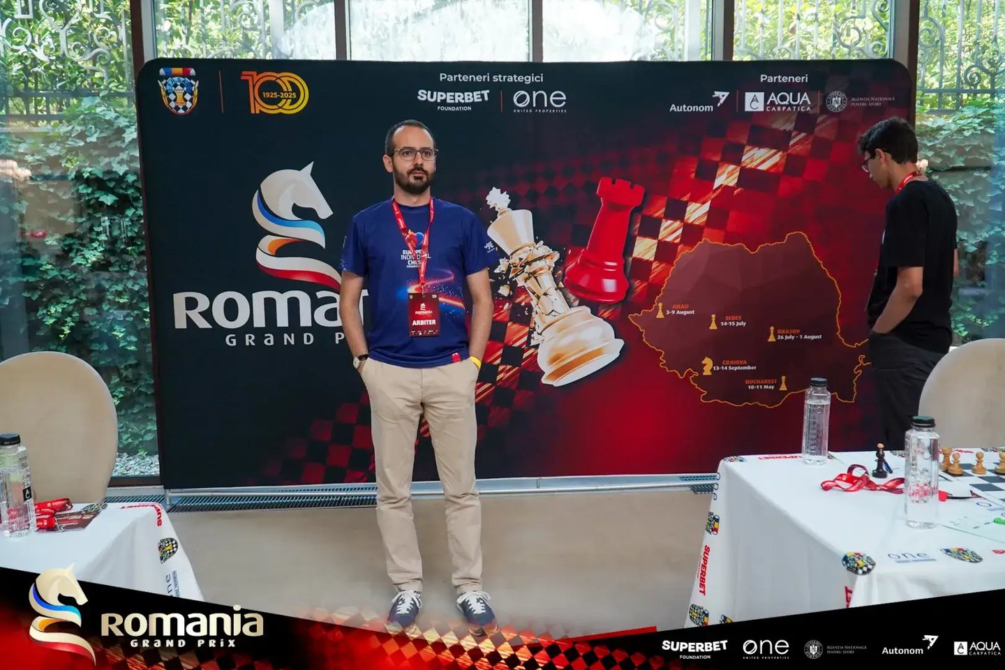 Chess Arbiter Vlad Ghita overseeing the playing hall at Arad Open 2025