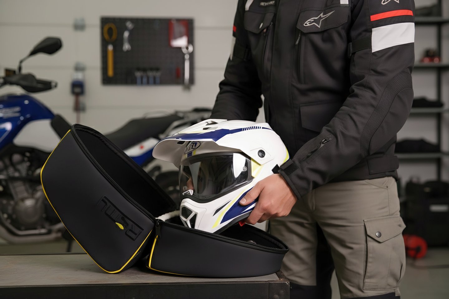 a man removing a helmet from a helmet bag