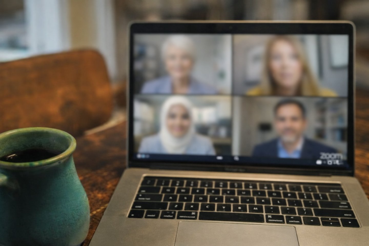 Laptop screen showing Zoom meeting