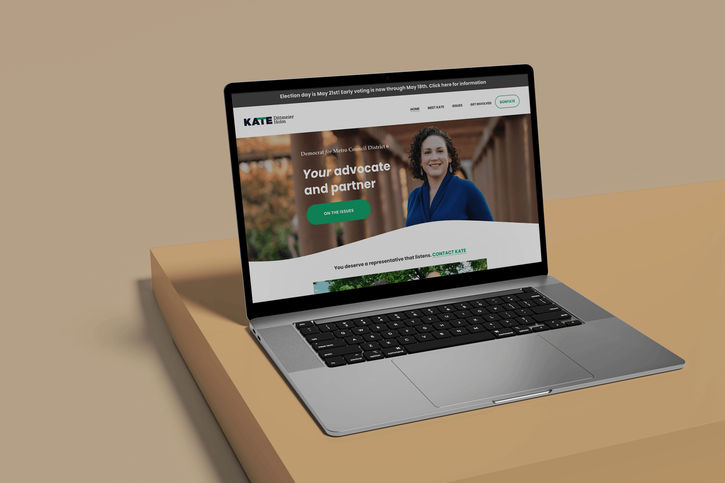 Open laptop with website for a political candidate