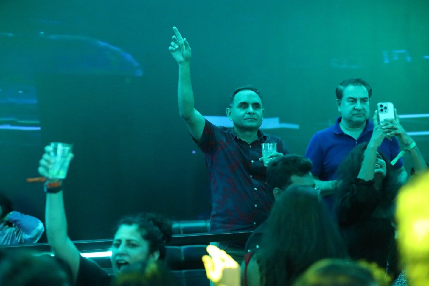 a man and woman in a crowd of people